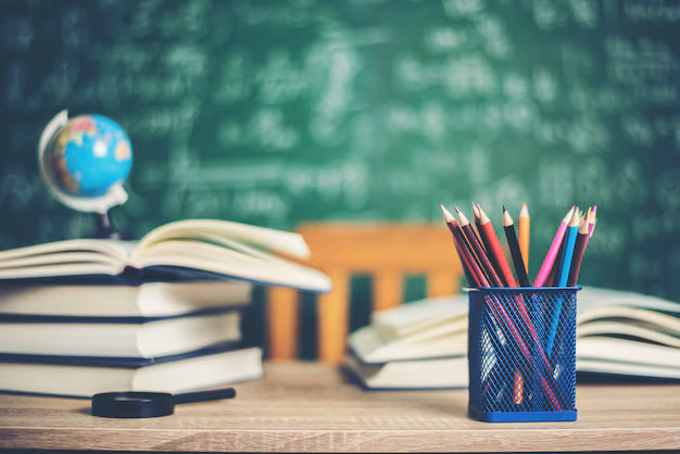 Tutor helping student with studies in modern learning environment